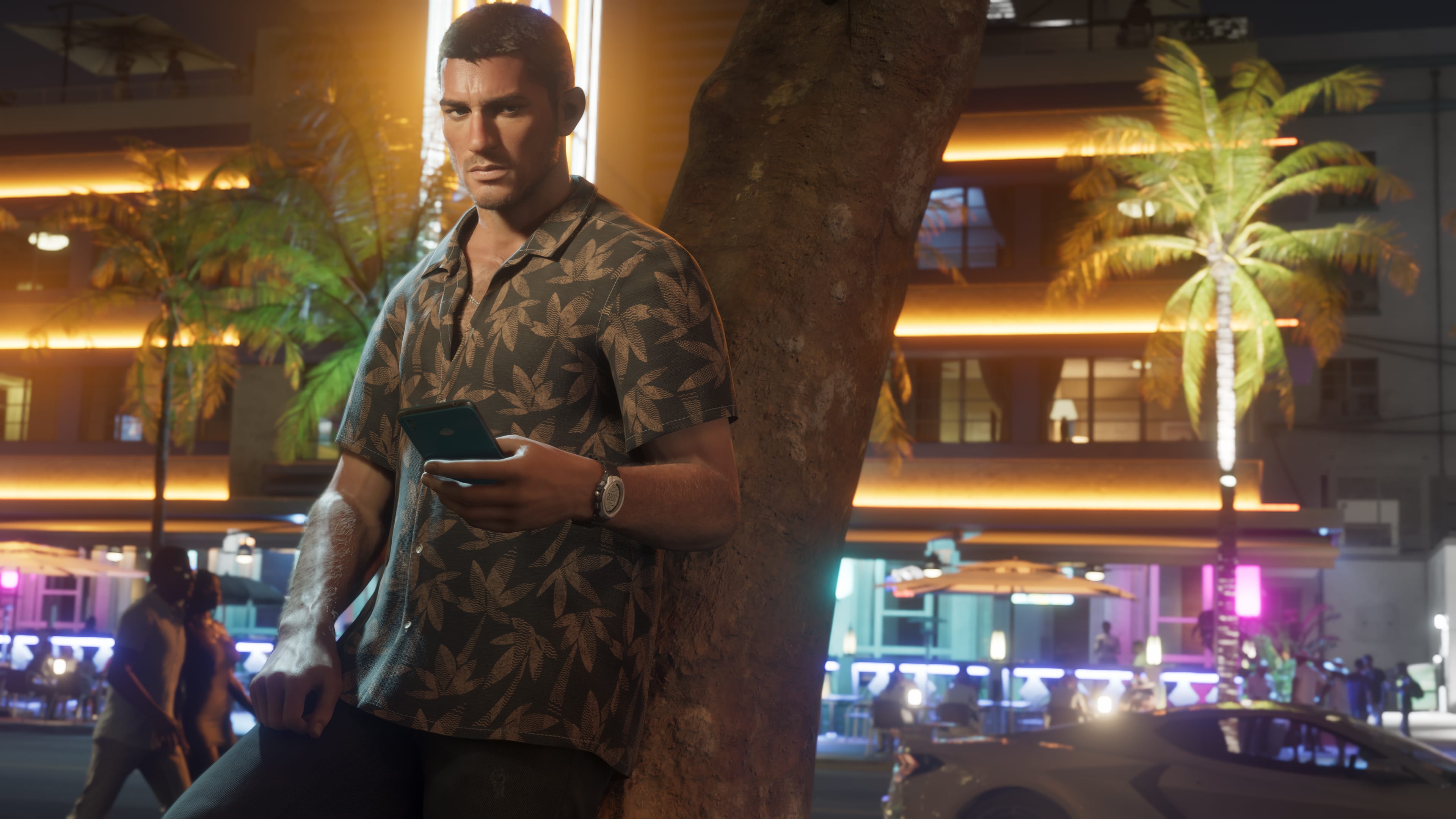 Official Grand Theft Auto VI artwork showing Jason looking at a phone in Vice City at night.